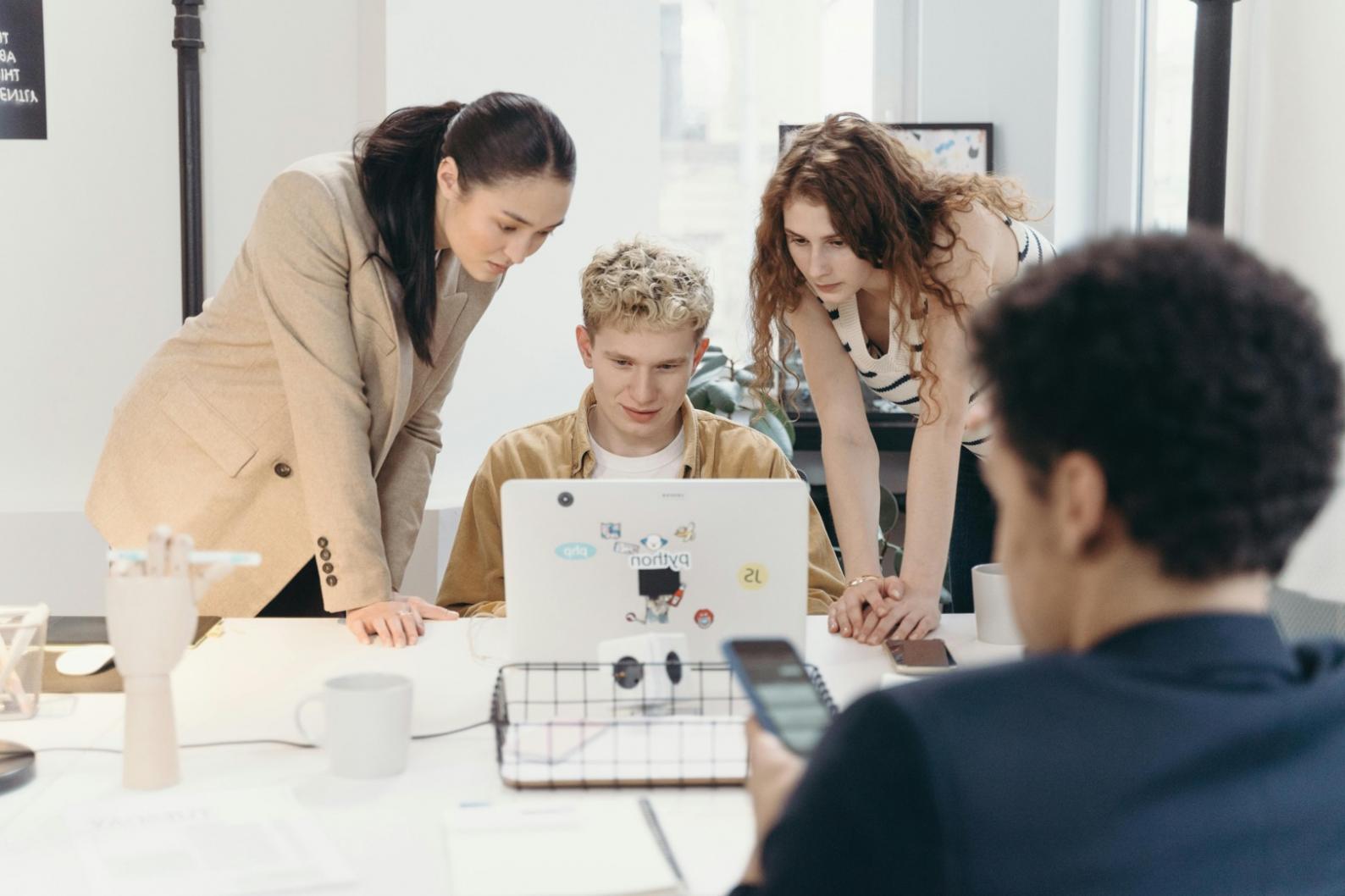 Team collaboration session analyzing business metrics